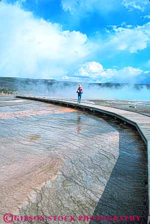 Stock Photo #10948: keywords -  baby basin carries carry child earth geologic geological geology geothermal geyser heat heated hot landscape midway mother national nature parent park parks path people pool preserve public released reserve route scenery scenic science steam thermal trail usa vent vert walk walking walkway water with woman wood wooden wyoming yellowstone