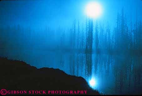 Stock Photo #10962: keywords -  blue calm cloud clouds dawn fog horz landscape lewis moisture mood moody national nature park parks peaceful pine preserve public quiet reflect reflecting reflection reflects reserve river rivers scenery scenic serene serenity silhouette silhouettes sun tree trees usa vapor water wyoming yellowstone