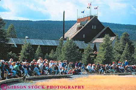 Stock Photo #10969: keywords - architecture audience crowd crowded design exterior faithful for geyser horz hotel hotels inn inns national old outside park parks people preserve public reserve style tradition traditional usa wait waiting wood wooden wyoming yellowstone