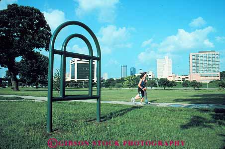 Stock Photo #13031: keywords -  cities city couple exercise fort ft ft. horz in jog jogger joggers jogging outdoor outside park parks people public run runner runners running runs summer texas workout worth
