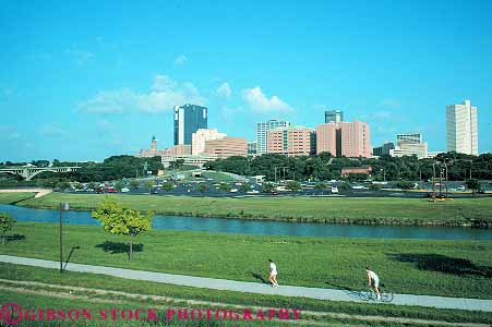Stock Photo #13709: keywords -  bicycle bicycling bicyclist bike biker biking buildings cities city cityscape cityscapes conditioning downtown exercise exercising fitness fort ft ft. grass green health horz jog jogger joggers jogging jogs municipal open outdoor outside park parks path people physical ride rider riding route skyline skylines space summer texas trail trails trinity urban warm workout worth