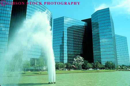 Stock Photo #11839: keywords - building buildings cities city dallas downtown fountain fountains horz hotel lincoln splash spray spraying texas urban water