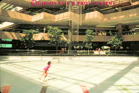 Stock Photo #11844: keywords - balconies balcony center dallas galleria girl horz ice icy indoor indoors motion move moving rink rinks skate skater skates skating texas