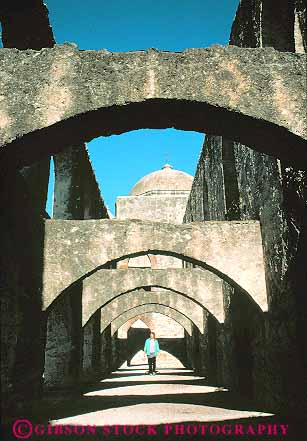 Stock Photo #11455: keywords -  american antonio arch arches building church historic history jose masonry mexican mission missions national old park parks public san site stone texas through vert walking woman