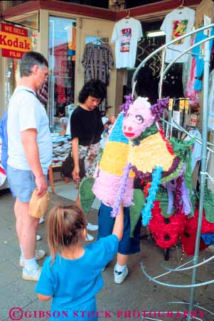 Stock Photo #11458: keywords -  antonio business buy buyer buyers children customer customers families family market markets parent parents people retail san shoppers shopping square store stores texas vert