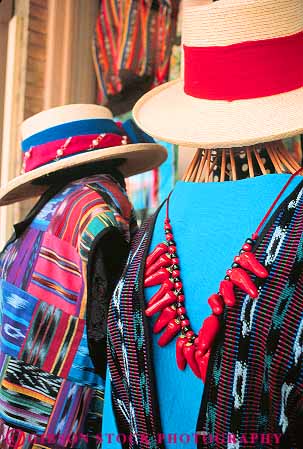 Stock Photo #11461: keywords -  antonio clothes clothing colorful display displays fabric hat hats merchandise retail san sell seller selling shirt shirts southwest style texas vert