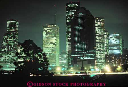 Stock Photo #7561: keywords -  america american architecture building buildings business center cities city cityscape cityscapes dark downtown dusk evening horz houston light lighting lights modern new night office offices skyline skylines texas urban usa west window windows