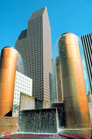 Stock Photo #11883: keywords -  architecture art buildings design downtown fountain gold golden high houston in modern municipal office park parks public rise sculpture sculptures shape shapes style texas tranquility urban vert water