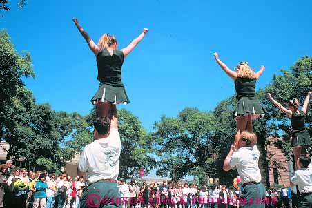 Stock Photo #11885: keywords -  acrobat acrobatics acrobats america cheerleaders college downtown horz houston lift lifted lifting men skill student students team texas urban walk women