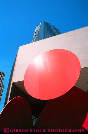 Stock Photo #11893: keywords -  abstract and architecture building circle circular downtown houston office red round sculpture sculptures texas vert