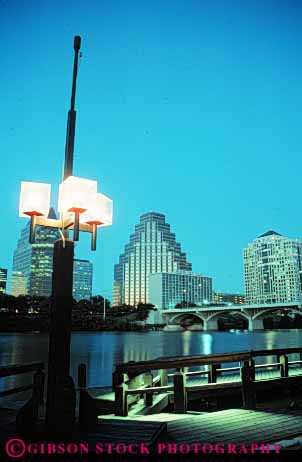 Stock Photo #7865: keywords -  america american architecture austin building buildings business center cities city cityscape cityscapes colorado dock docks downtown dusk lake lighting lights modern new office offices river skyline skylines sunset sunsets texas urban us usa vert water