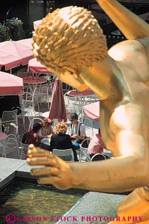 Stock Photo #9076: keywords - cafe cafes center city courtyard dine dining downtown gold golden mall new outdoor outside park people plaza plazas rockefeller sculpture sculptures statuary statue summer vert york