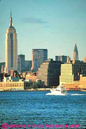 Stock Photo #9092: keywords - boat boating building buildings city cityscape cityscapes downtown empire hudson new office river skyline skylines state urban vert water york