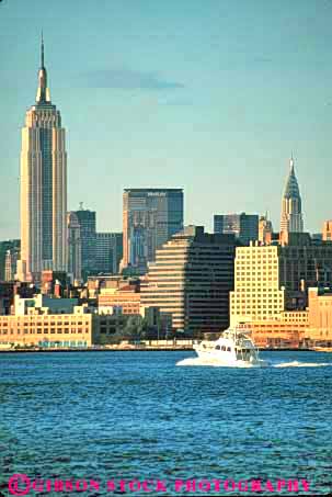 Stock Photo #9092: keywords -  boat boating building buildings city cityscape cityscapes downtown empire hudson new office river skyline skylines state urban vert water york