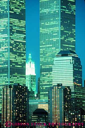 Stock Photo #9094: keywords - building buildings city dark downtown dusk evening grid high lighted lighting lights linear lower montana new night office pattern tall urban vert window windows york