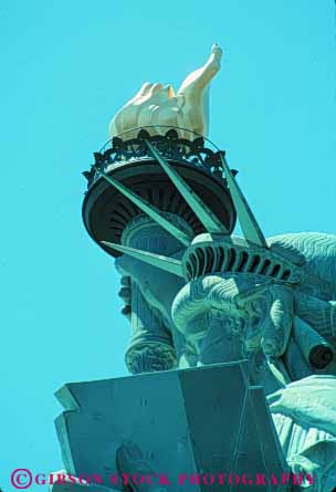 Stock Photo #9111: keywords - attraction city famous gift green landmark liberty metal new of statue statues steel symbol symbolic symbolize symbolizes tall torch tourist vert york