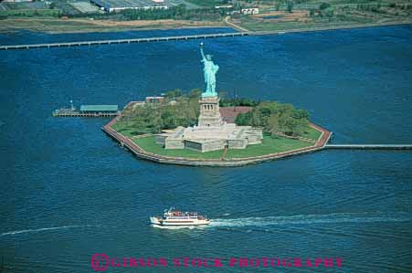 Stock Photo #9113: keywords -  aerial aerials attraction boat city famous gift green harbor horz island islands landmark liberty metal new of overhead statue statues steel symbol symbolic symbolize symbolizes tall tour tourist tours york