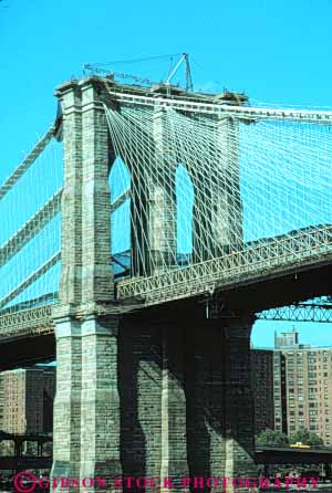 Stock Photo #9128: keywords - bridge bridges brooklyn cable city east engineer engineered engineering famous historic landmark landmarks new old over river rock steel stone suspended suspends suspension vert york