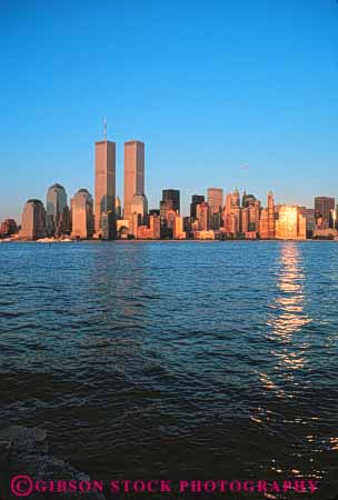 Stock Photo #7569: keywords -  america american architecture building buildings business center cities city cityscape cityscapes downtown dusk modern new office reflecting reflection reflects skyline skylines sunset urban usa vert york