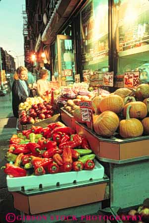 Stock Photo #9156: keywords - city dark dusk evening greenwich market markets new night produce shopper shopping shops sidewalk store stores vert village woman york