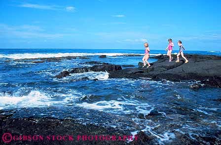 Stock Photo #13056: keywords - child children coast destination exploring girl girls habitat hawaii hawaiian horz island islands leisure oahu recreation released rock shore surf tidepool tidepools travel tropical vacation waikiki