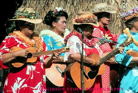 Stock Photo #13090: keywords - color colorful costume costumed costumes dance dancers dances dancing demonstrate demonstrates demonstrating demonstrator demonstrators destination dress entertain entertainer entertaining entertainment entertains female group groups guitar guitars hat hats hawaii hawaiian heritage horz hula instrument instruments islands music musical musicians oahu people perform performance performer performers performing person show showing shows string tradition traditional travel tropical woman women