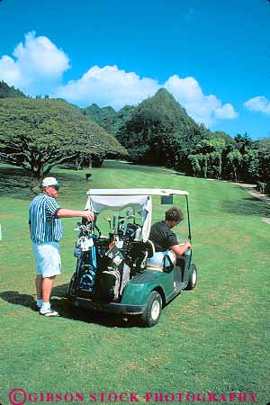Stock Photo #11738: keywords -  cart club country couple destination golf golfer golfers golfing hawaii man oahu recreation resort resorts travel tropical vacation vert