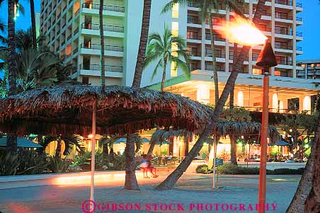 Stock Photo #11744: keywords -  beach dark destination dusk evening hawaii hilton horz hotel lighting lights night oahu recreation resort resorts travel tropical vacation waikiki