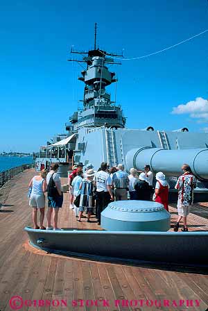 Stock Photo #13100: keywords - attraction battleship battleships big commemorate commemorates commemorating harbor hawaii hawaiian honolulu huge ii large memorial memorials missouri monument monuments navy oahu pearl people ship ships tour touring tourist tourists tours tropical two uss vert war wars world