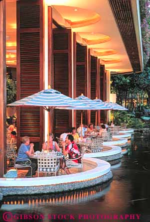 Stock Photo #8629: keywords - air atmosphere beach cove coves destination dine dining dinner dusk evening hawaii hawaiian hilton hotel hotels island islands oahu open outdoor outside patio patios people relax relaxing resort resorts restaurant tourists travel tropical umbrella umbrellas usa vacation vert waikiki warm