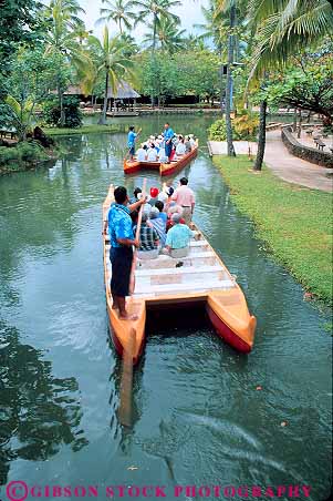Stock Photo #13126: keywords -  boat boats canoe canoes center cultural hawaii hawaiian hawaiians heritage hull hulls island islands long native natives oahu people polynesian recreate recreates recreating tour tours tropical twin vert water