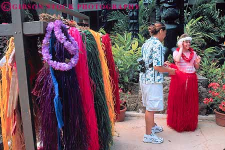 Stock Photo #13129: keywords -  center clothes clothing colorful costume costumed costumes cultural for grass hawaii hawaiian heritage horz island islands oahu outfit people photo polynesian skirt tropical vacation wears women