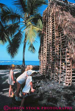 Stock Photo #13132: keywords -  attraction big child children city destination girl girls grass hawaii hawaiian historic history house island look national native of park parks people refuge released shack site sites tourist tourists travelers vert visitor visitors