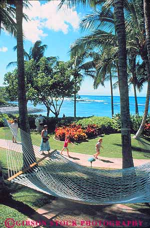 Stock Photo #13144: keywords -  big destination hawaii hawaiian hilton island islands leisure outdoor outside people play playing recreation resort resorts shoreline sport stroll travel vacation vert waikoloa walk walker walking