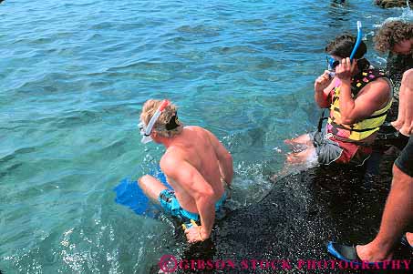 Stock Photo #13146: keywords - bay big destination dive diver divers diving enter hawaii hawaiian honaunau horz island islands leisure outdoor outside people play playing recreation skin snorkel snorkelers sport swim swimming travel vacation water