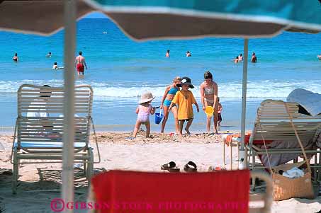 Stock Photo #13147: keywords -  baby bay beach beaches big child children coast destination fun group happy hawaii hawaiian horz in island islands kid kids lani leisure mauna ocean outdoor outside play playing recreation sand sandy shore sport surf toddler travel vacation warm water
