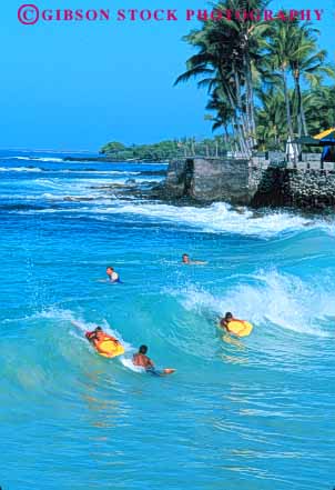 Stock Photo #8650: keywords - beach beaches big boogeeboard coast coastal destination hawaii hawaiian island islands kailua kona marine maritime ocean people play recreation resort resorts sands sea seashore seawater shore shoreline sport sports surf surfing swim swimmers swimming travel tropical usa vacation vert water wave waves white
