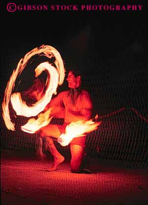 Stock Photo #8653: keywords - big dance dancer dancing danger dangerous destination drums fire fireknife flame hawaii hawaiian hot island islands man men native night of perform performance performer performing polynesia resort resorts ritual ritualistic show torch torches tradition traditional travel tropical usa vacation vert
