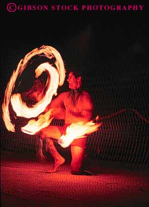 Stock Photo #8653: keywords -  big dance dancer dancing danger dangerous destination drums fire fireknife flame hawaii hawaiian hot island islands man men native night of perform performance performer performing polynesia resort resorts ritual ritualistic show torch torches tradition traditional travel tropical usa vacation vert