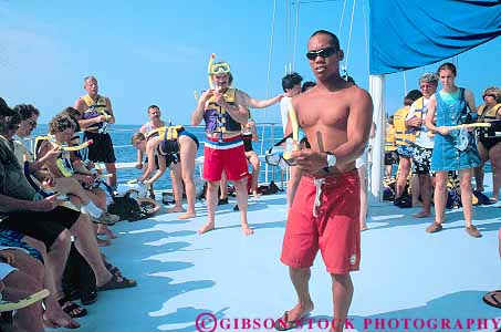 Stock Photo #13166: keywords -  big boat dive diving gives hawaii hawaiian horz instruction island islands kailua kona man recreation skin snorkel sport teach teacher teaching tourist tourists tropical vacation