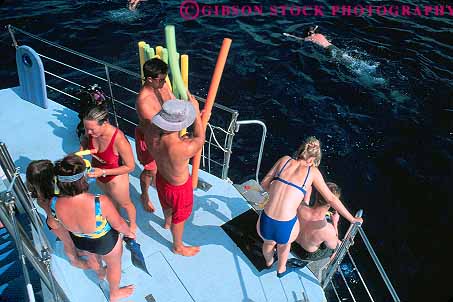 Stock Photo #13167: keywords -  big boat dive diving hawaii hawaiian horz island islands kailua kona ocean people play playing recreation skin sport swim swimming swims tourist tourists tropical vacation water