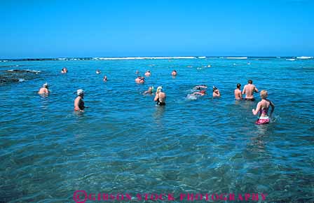 Stock Photo #13171: keywords - beach beaches big coast group hawaii hawaiian horz island islands kahaluu kailua kona ocean people recreation sea snorkel snorkelers snorkeling sport sunbath sunbathing sunny sunshine swim swimming tropical vacation warm water