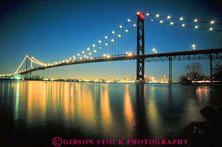 Stock Photo #12242: keywords -  ambassador background black border borders boundary bridge bridges bright canada cities city cityscape cityscapes dark detroit dusk engineered engineering evening horz international lighting lights metal michigan night over reflect reflecting reflection reflects river rivers skyline skylines steel suspension usa