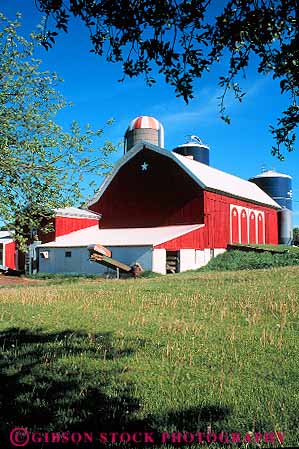 Stock Photo #13199: keywords -  agriculture angle angles barn barns bright building buildings cadillac clean colorful corner cylinder cylindrical elevator farms grain great lakes michigan midwest new rectangle region right round shape shapes shiny silo slope slopes sloping square vert