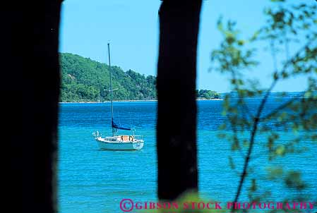 Stock Photo #13203: keywords - anchored bay blue boat boats grand great horz in lake lakes landscape michigan midwest region sail sailboat scenery scenic traverse water