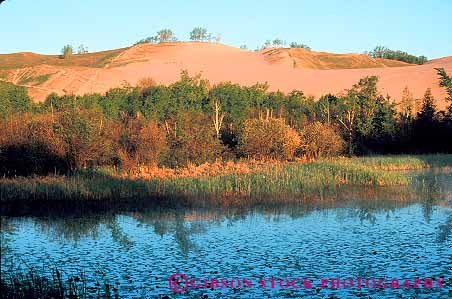 Stock Photo #13221: keywords - bear blown deposit deposited dune dunes great hill hills horz lake lakes lakeshore marsh michigan midwest national natural park parks pile pond region sand sanddune sanddunes sediment sleeping wind