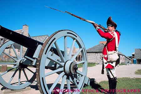 Stock Photo #13233: keywords -  aim aiming aims building buildings cannon cannons city colonial costume costumed dressed era flintlock fort forts great gun guns historic horz lakes log logs mackinaw michigan michilimackinac midwest reconstructed reconstruction reenact reenacted reenacting reenactment reenactor reenactors reenacts region released soldier uniform uniforms war weapon weapons wheel wood wooden