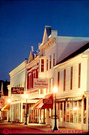 Stock Photo #12060: keywords -  architecture attraction buildings dark destination dusk evening island islands lighting lights mackinac main michigan night quaint resort resorts shop shops store stores street streets tourist town towns travel vert warm