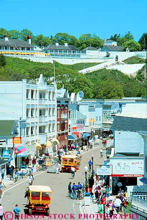 Stock Photo #12061: keywords - activity attraction buildings destination elevate elevated island islands mackinac main michigan overview people resort resorts road season street streets summer tourist town towns travel vert view