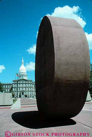 Stock Photo #13247: keywords -  building capitol capitols circle circular curve curved curves curving cylinder cylindrical great house lakes lansing legislature michigan near oval politics region roll round sculpture sculptures shadow shadows shape shapes state vert